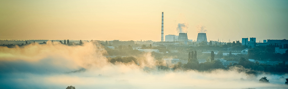 cityscape of power plants and the field with fog, filter