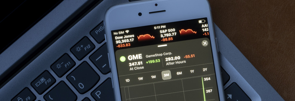 Photo of a mobile phone displaying the stock chart of the Gamestop stock.
