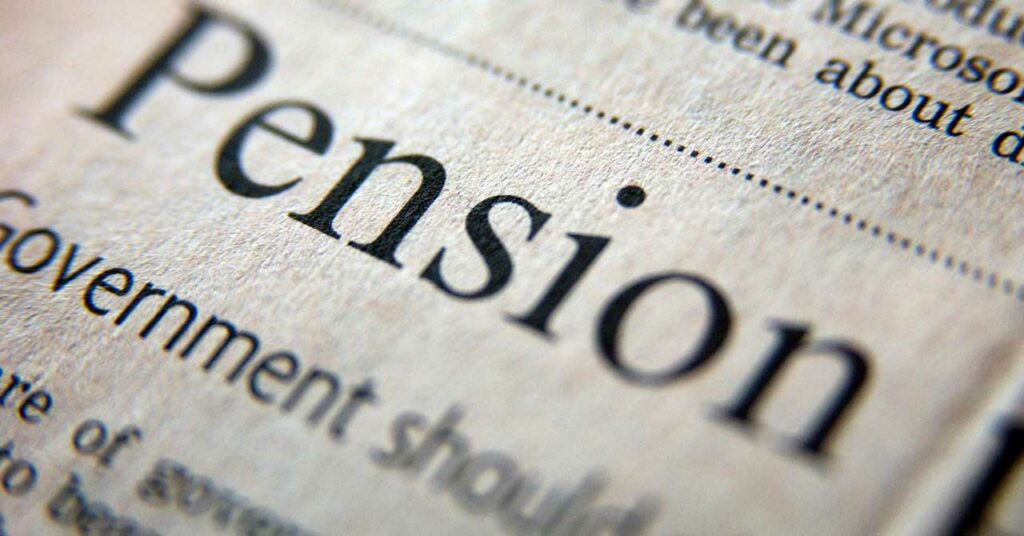 Closeup of the word pension in a newspaper.