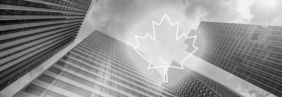Outline of a maple leaf overlaid over a photo of office buildings.
